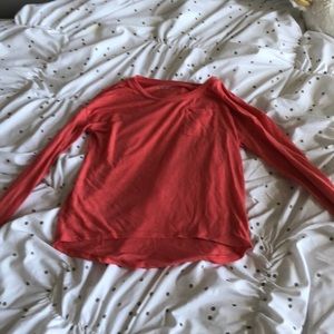 I’m selling a pink long sleeved shirt.